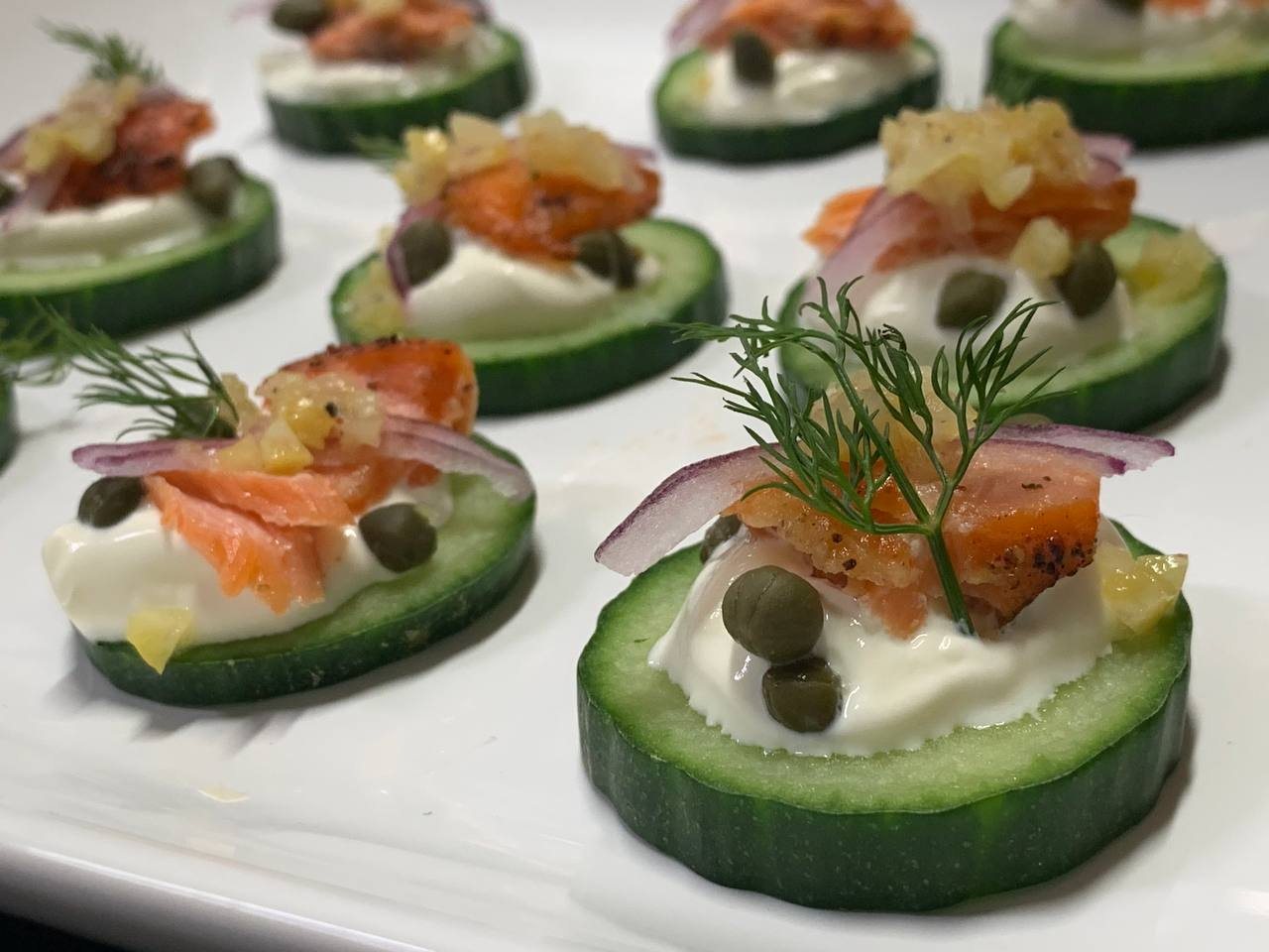 Smoked salmon cucumber rounds with capers and dill