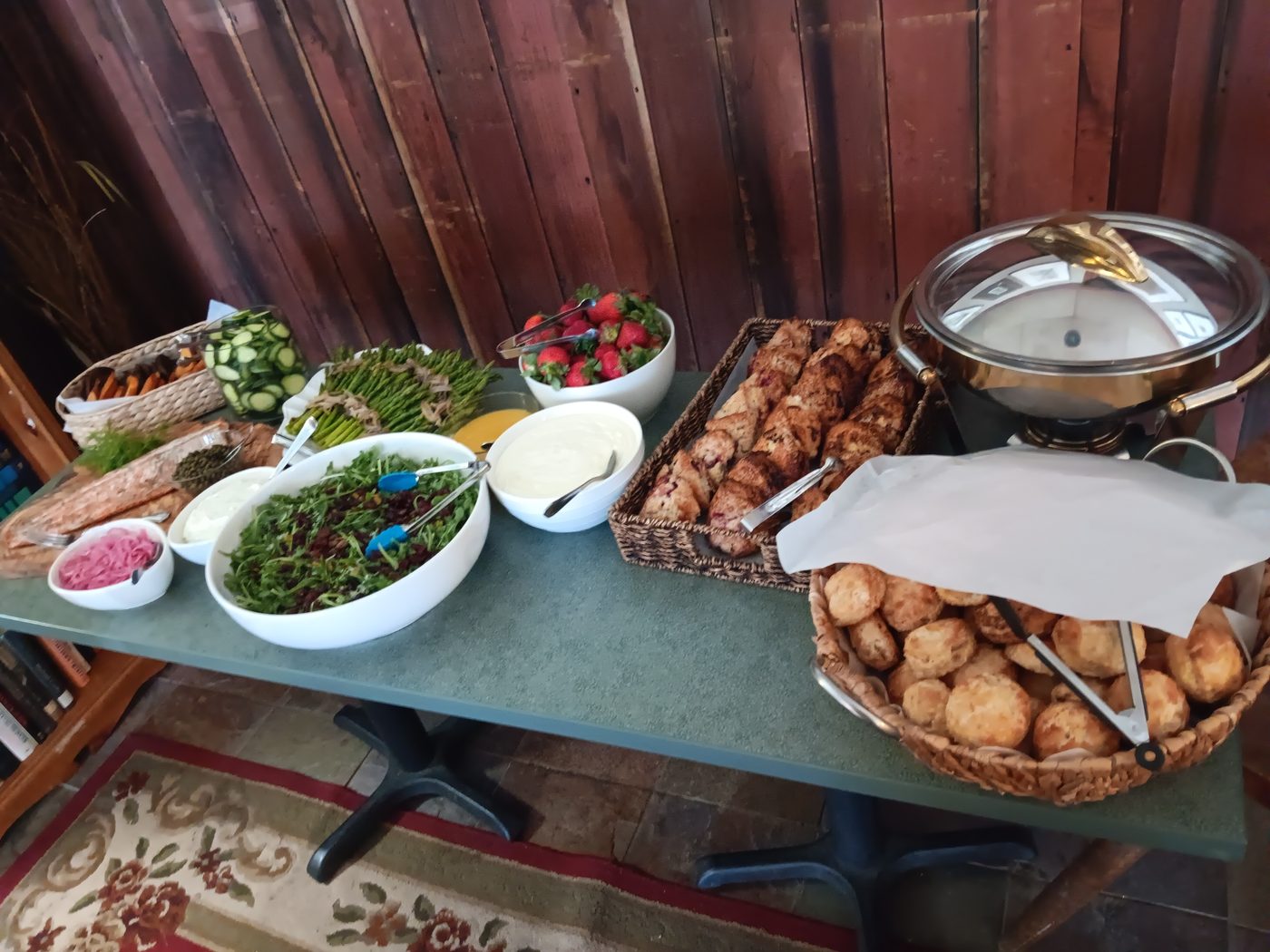 Scones, rolls, and baked goods at a brunch buffet